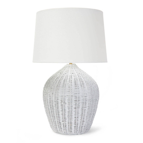 white rattan table lamp with a white shade and brass harp